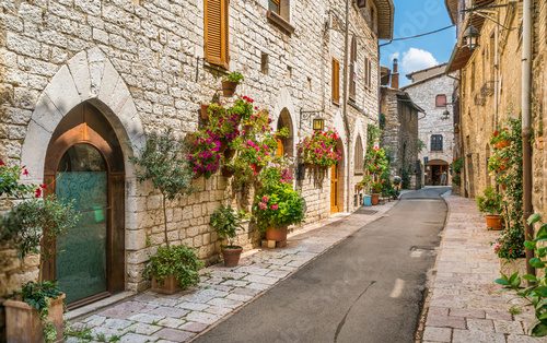 Fototapeta A picturesque sight in Assisi. Province of Perugia, Umbria, central Italy.