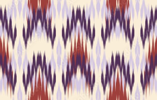 Fototapeta Ethnic abstract purple Seamless ikat pattern in tribal, folk embroidery, and Asia style. Aztec geometric art ornament print. Design for carpet, wallpaper, clothing, wrapping, fabric, cover.