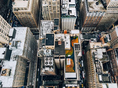 Fototapeta Roofs with air conditioning systems machinery, Cityscape metropolis, densely populated city with infrastructure